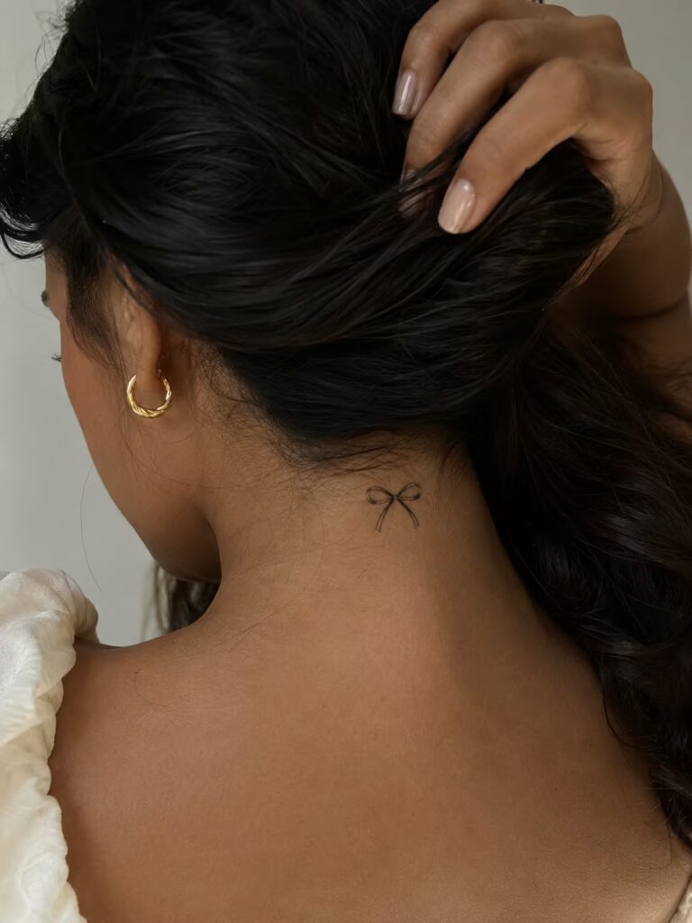 A Tiny Delicate Bow at the Hairline