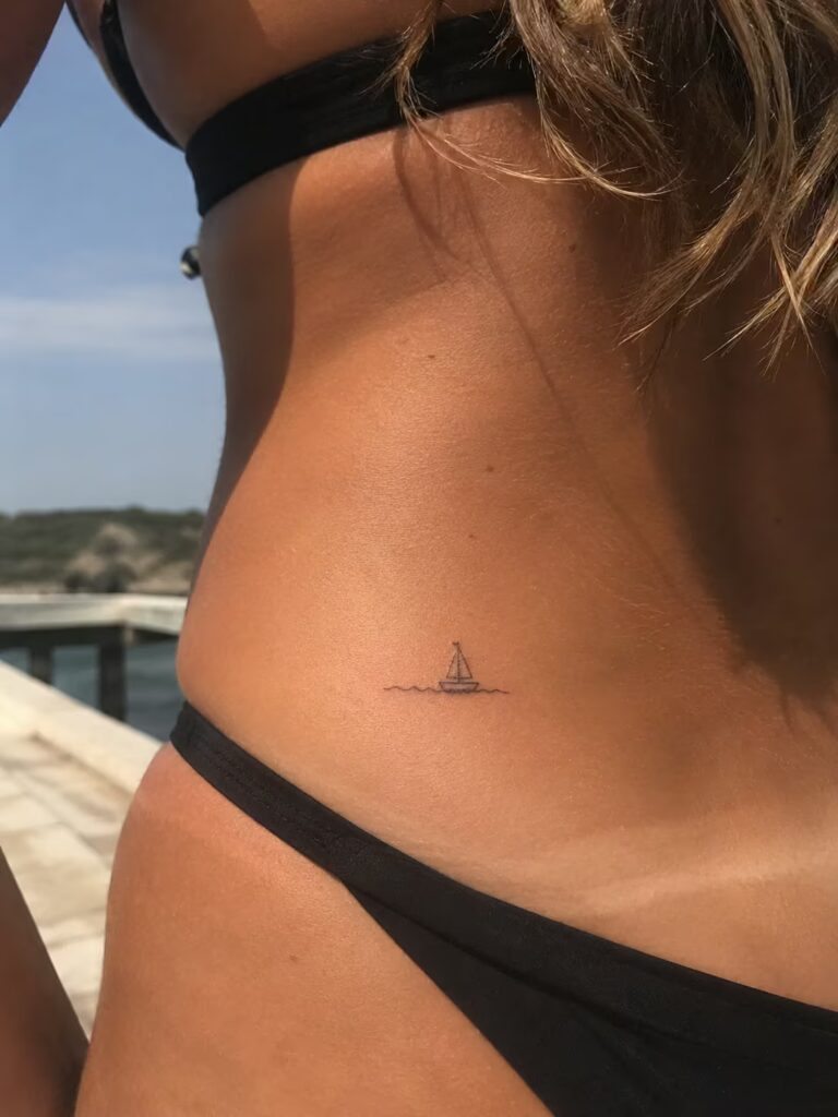 A tiny sailboat on a wave line at the hip for direction and adventure