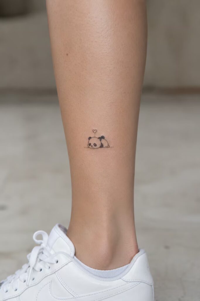 Resting Panda Lower Leg Tattoo